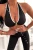 czarny sportowy komplet top z głębokim dekoltem i legginsy modelujące push-up