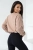 damski komplet beżowa bluza oversize i czarne legginsy z wysokim stanem oraz zamkiem z przodu