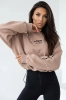 damski komplet beżowa bluza oversize i czarne legginsy z wysokim stanem oraz zamkiem z przodu